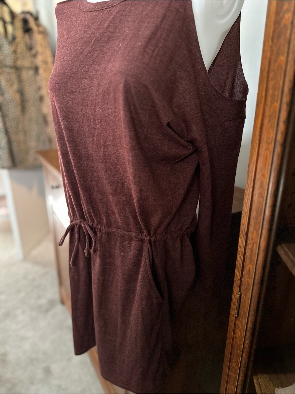 NWOT- Shoulder cutouts and deep plunge back. Soft fabric, never worn.